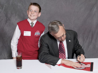 Illustration for article titled Many Special People Excitedly Posed For Pictures With Jim Tressel Last Week